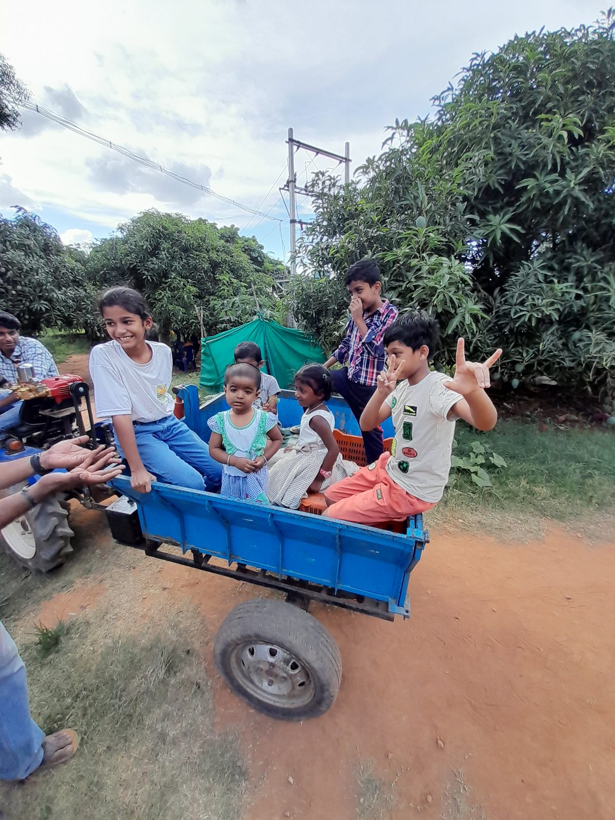 Kids enjoying tractor ride at GG Farm
